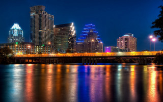 City skyline bridge river night 79 - the water and a bridge in the foreground free wallpaper