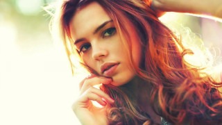 Red hair portrait posing solo - her cheek free wallpaper
