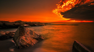 Sunset rocky beach large foreground - a sunset over a rocky beach free wallpaper