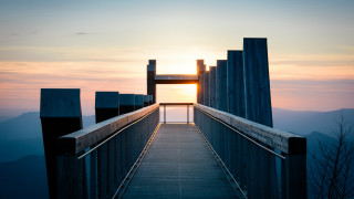Wooden walkway sunset mountains gate - the top of it free wallpaper