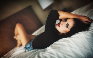 Woman bed blur asian fashion - her arm behind her head free wallpaper