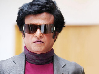 Man sunglasses turtleneck sweater wall - movie still frame free wallpaper