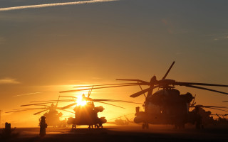 Military helicopters sunset contrails backlit - donald sherwood free wallpaper