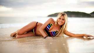 Beach blonde woman seductive smile - seductive free wallpaper
