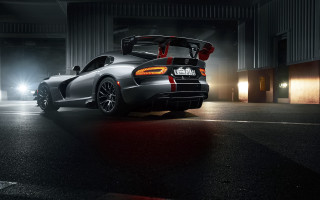Sports car parking garage night - its hood open free wallpaper