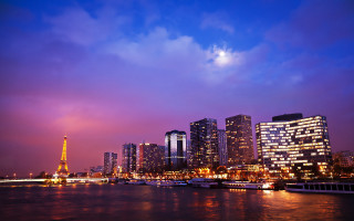 Paris skyline river boat night - a purple sky free wallpaper