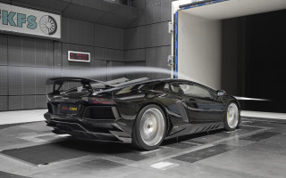 Black sports car watering tires - tire free wallpaper