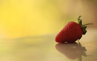 Strawberry yellow background macro shallow - delaunay free wallpaper