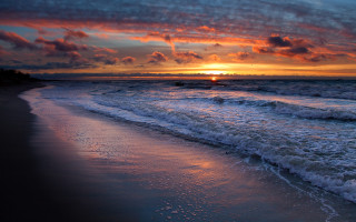 Sunset ocean waves beach person 6 - the beach in the distance free wallpaper