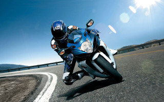 Motorcycle ride bridge mountains sunshine - action pose free wallpaper