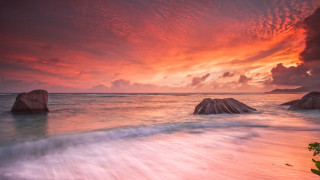 Sunset ocean rocks red sky 2 - a red sky above free wallpaper