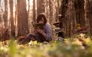 Woman woods reading smile books - e. william gollings free wallpaper