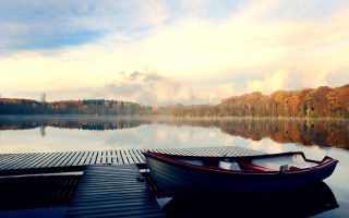 Docked boat lake trees clouds - florianne becker free wallpaper