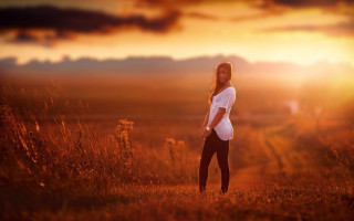 Woman field sunset hands hips - alena aenami free wallpaper