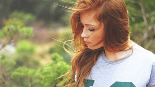 Red haired woman forest cellphone - area free wallpaper
