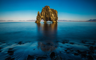 Rock formation water mountain sky - a blue sky free wallpaper