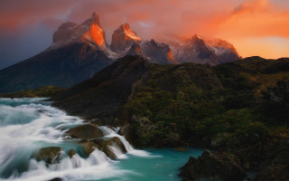 Mountain river waterfall sunset cliff - a waterfall in the foreground free wallpaper
