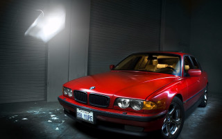 Red car garage lightbulb door - a red car free wallpaper