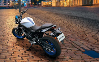 Motorcycle brick road evening sign - a sign free wallpaper