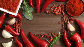 Wooden table red peppers garlic - a wooden table free wallpaper