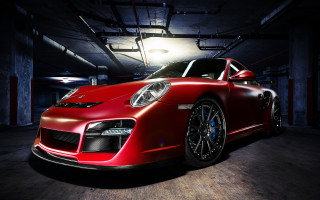Red sports car garage spotlight - a light free wallpaper