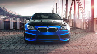 Blue car brick road fence - a blue car free wallpaper