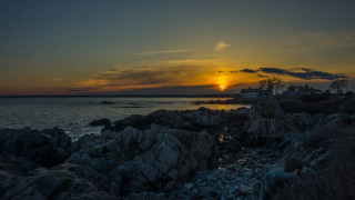 Sunset rocky shore lighthouse water - anne rigney free wallpaper