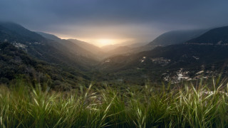 Valley mountains sunset clouds lake - a view of a valley free wallpaper