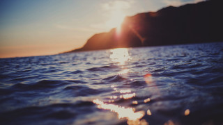 Sunshine ocean mountains blue sky - a photo free wallpaper
