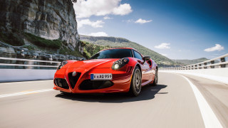 Red sports car mountain road 2 - a sky background free wallpaper for desktop