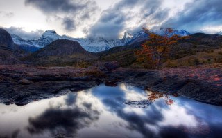 Mountain lake forest clouds sunset 3 - a cloudy sky in the background free wallpaper