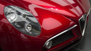 Red sports car headlight photorealism - a car free wallpaper