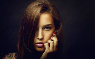 Woman redflower blackbackground photorealistic portrait - a red flower free wallpaper