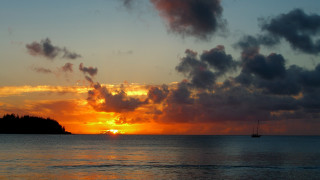 Sunset boat water clouds island - free sunset wallpaper