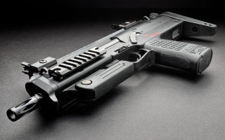 Gun laser table black background - the side of it free wallpaper