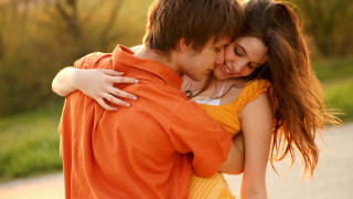 Romantic hug street sunlight blurry - grass and trees free wallpaper
