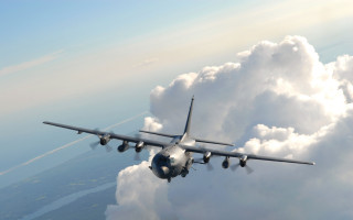 Large jetliner cloudy sky city - digital free wallpaper