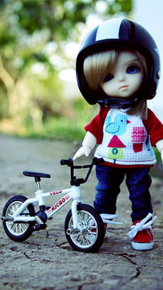 Doll riding bike helmet red - a helmet free wallpaper