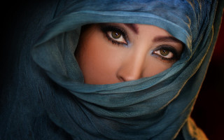 Serious woman blue scarf eyes - egyptian art free wallpaper