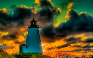 Lighthouse hill sunset clouds autumn - a lighthouse free wallpaper