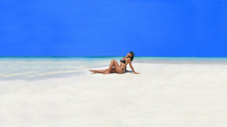 Woman beach bikini sunny sky - a sunny day free wallpaper