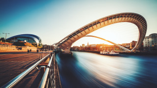 Bridge boat building cityscape reflection - a bridge over a river free wallpaper