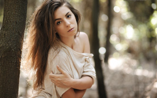 Woman woods serious brown hair - flowing hair free wallpaper