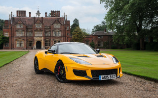 Yellow sports car building driveway 2 - a yellow sports car free wallpaper