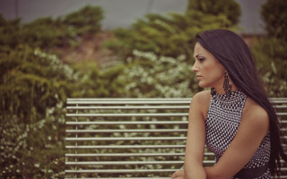 Woman park bench serious portrait - a bench in a park free wallpaper