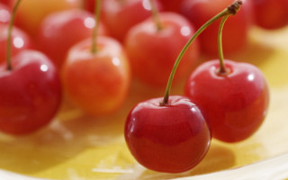 Cherries yellow cloth plate blurry - underneath free wallpaper