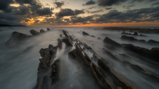 Sunset ocean rocks cloudy sky 9 - rock free wallpaper