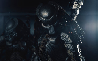 Man black suit helmet gun - his hand free wallpaper