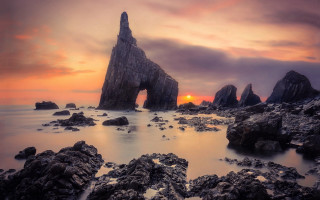 Rock formation sunset ocean clouds - cloudy free wallpaper