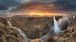 Waterfall sunset clouds mountain beach - panoramic free wallpaper for desktop